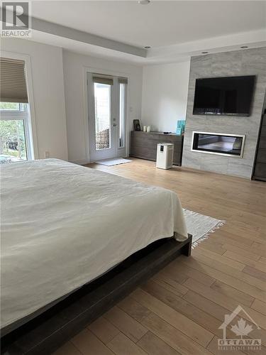 420 Athlone Avenue, Ottawa, ON - Indoor Photo Showing Bedroom With Fireplace