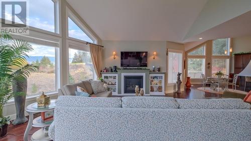 136 Sumac Ridge Drive, Summerland, BC - Indoor Photo Showing Living Room With Fireplace