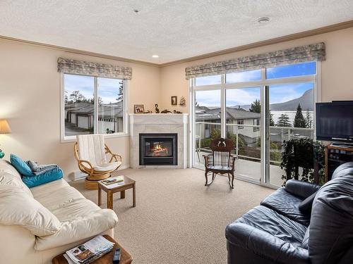 5-1700 Pritchard Rd, Cowichan Bay, BC - Indoor Photo Showing Living Room With Fireplace