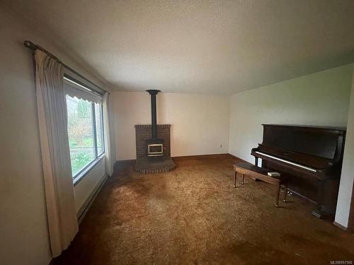 366 Jensen Ave West, Parksville, BC - Indoor With Fireplace