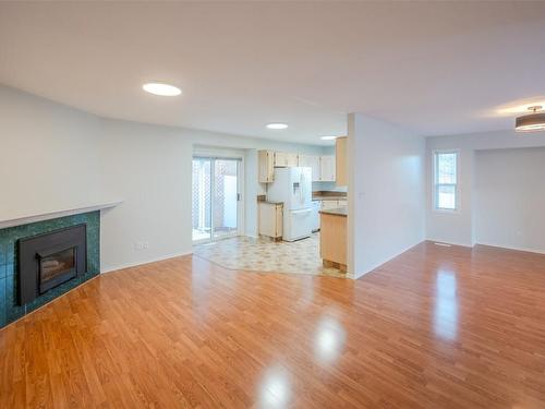 46-3096 South Main Street, Penticton, BC - Indoor Photo Showing Living Room With Fireplace