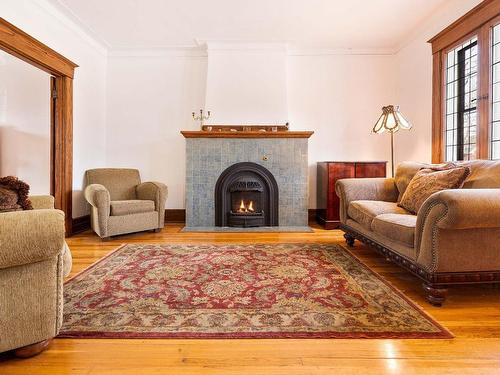 Salon - 4620 Av. Patricia, Montréal (Côte-Des-Neiges/Notre-Dame-De-Grâce), QC - Indoor Photo Showing Living Room With Fireplace