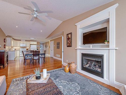 82 Greenway Dr, Wasaga Beach, ON - Indoor Photo Showing Living Room With Fireplace