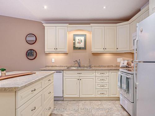 82 Greenway Dr, Wasaga Beach, ON - Indoor Photo Showing Kitchen With Double Sink