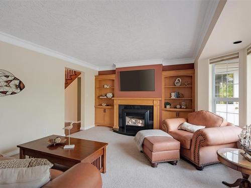 960 Arundel Dr, Saanich, BC - Indoor Photo Showing Living Room With Fireplace