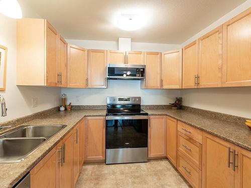 103-4699 Muir Rd, Courtenay, BC - Indoor Photo Showing Kitchen With Double Sink