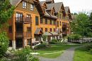 Frontage - 2-1510 Ch. Du Versant-Soleil, Mont-Tremblant, QC  - Outdoor With Facade 