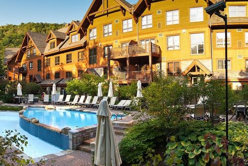 ExtÃ©rieur - 2-1510 Ch. Du Versant-Soleil, Mont-Tremblant, QC - Outdoor With In Ground Pool