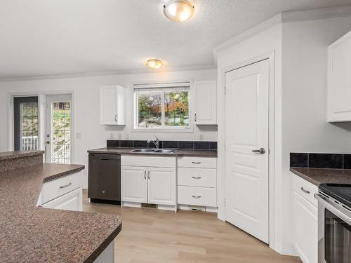 3174 Mustang Court, Kelowna, BC - Indoor Photo Showing Kitchen With Double Sink