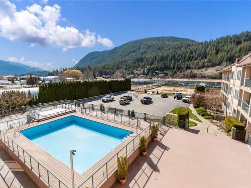 303-1002 Riverside Avenue, Sicamous, BC - Outdoor With In Ground Pool With Deck Patio Veranda With View
