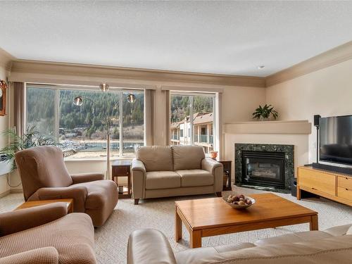 303-1002 Riverside Avenue, Sicamous, BC - Indoor Photo Showing Living Room With Fireplace
