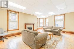 Front room looking into turret w/ OG stained glass - 