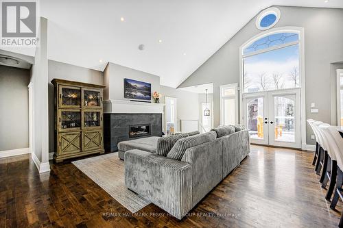 16 Bridle Tr, Springwater, ON - Indoor Photo Showing Living Room With Fireplace