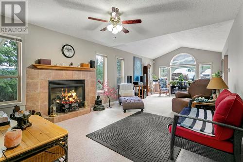 10662 Pinecrest Road, Vernon, BC - Indoor Photo Showing Living Room With Fireplace