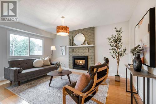 183 Yellow Birch Dr, Kitchener, ON - Indoor Photo Showing Living Room With Fireplace