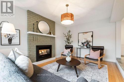 183 Yellow Birch Dr, Kitchener, ON - Indoor Photo Showing Living Room With Fireplace