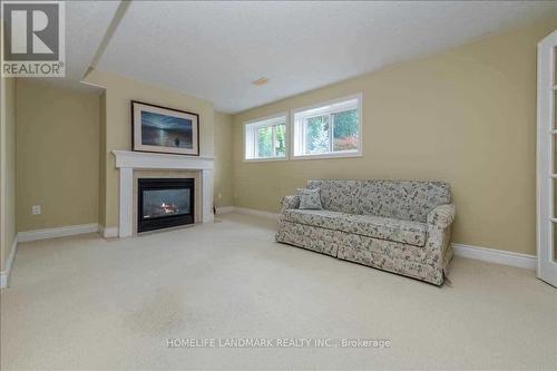 #33 -5 Invermara Crt, Orillia, ON - Indoor Photo Showing Living Room With Fireplace
