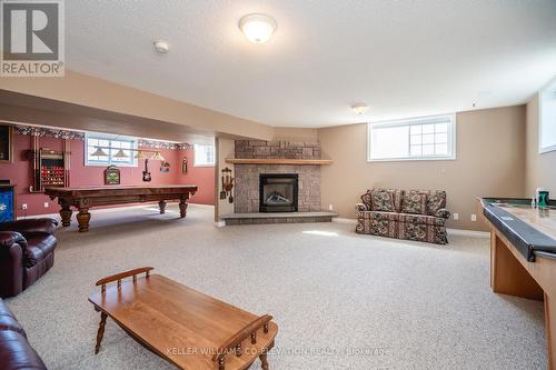 8485 Highway 93, Tiny, ON - Indoor With Fireplace