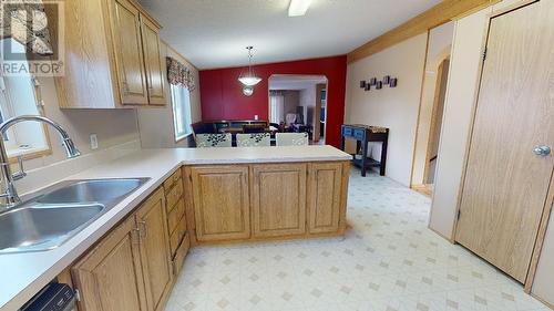10285 Lily Street, Fort St. John, BC - Indoor Photo Showing Kitchen With Double Sink