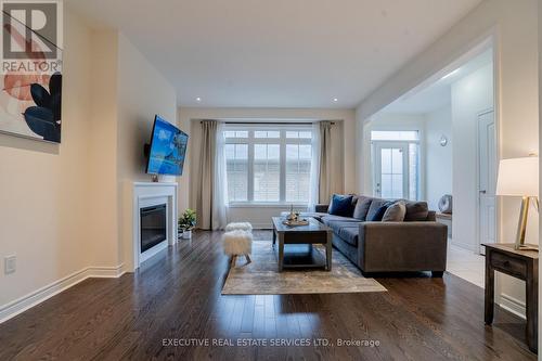 249 Inspire Boulevard, Brampton, ON - Indoor Photo Showing Living Room With Fireplace