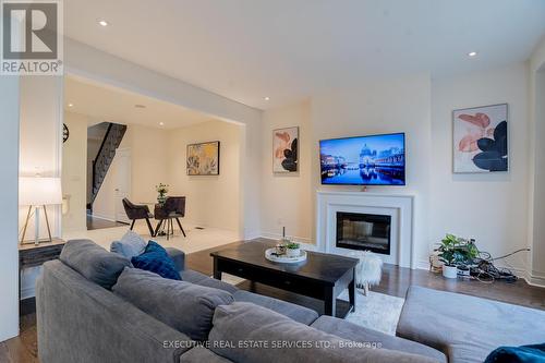 249 Inspire Boulevard, Brampton, ON - Indoor Photo Showing Living Room With Fireplace