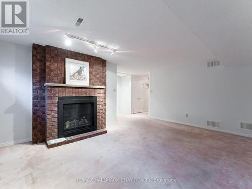 9 Briarwood Drive, New Tecumseth, ON - Indoor Photo Showing Living Room With Fireplace