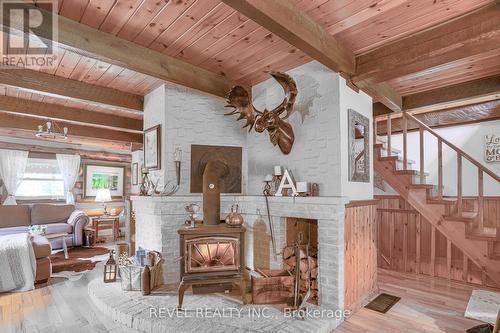 86 Four Points Road, Kawartha Lakes, ON - Indoor With Fireplace