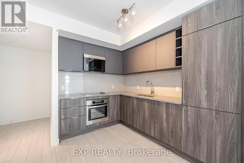 #3108 -2033 Kennedy Rd, Toronto, ON - Indoor Photo Showing Kitchen With Upgraded Kitchen