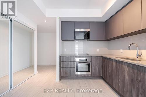 #3108 -2033 Kennedy Rd, Toronto, ON - Indoor Photo Showing Kitchen With Upgraded Kitchen