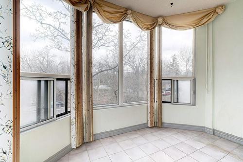 Sunroom could be used as a Den or Sunny Office - 2121 Lakeshore Road|Unit #307, Burlington, ON - Indoor Photo Showing Other Room