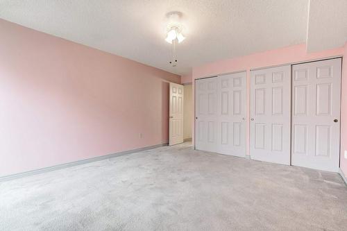2nd Bedroom features wall to wall closets. - 2121 Lakeshore Road|Unit #307, Burlington, ON - Indoor Photo Showing Other Room