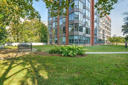 Tranquil private grounds. - 2121 Lakeshore Road|Unit #307, Burlington, ON - Outdoor With Facade