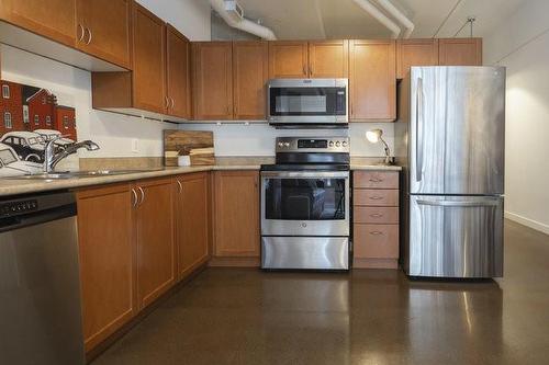 66 Bay Street S|Unit #413, Hamilton, ON - Indoor Photo Showing Kitchen With Double Sink