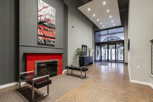 66 Bay Street S|Unit #413, Hamilton, ON - Indoor With Fireplace