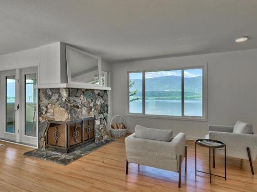 1681 28Th Ave Ne, Out Of District, BC - Indoor Photo Showing Living Room With Fireplace