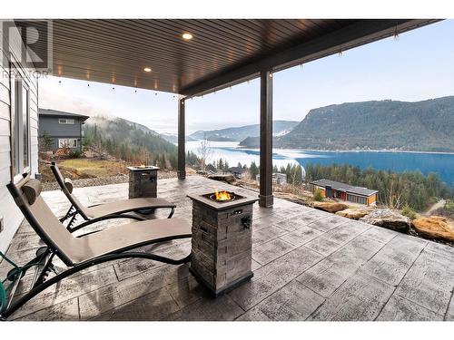 226 Sunset Drive, Sicamous, BC - Outdoor With Body Of Water With Deck Patio Veranda With View With Exterior