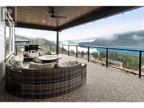 226 Sunset Drive, Sicamous, BC - Outdoor With Body Of Water With Deck Patio Veranda With View With Exterior