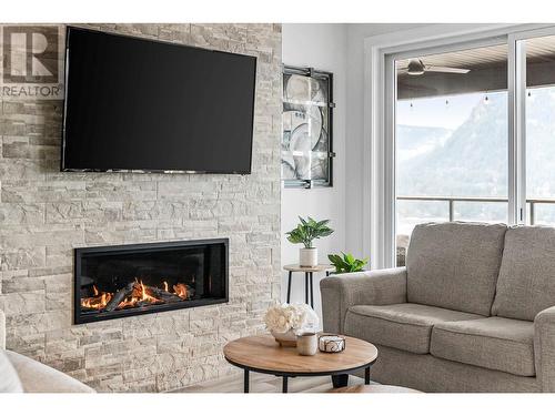 226 Sunset Drive, Sicamous, BC - Indoor Photo Showing Living Room With Fireplace