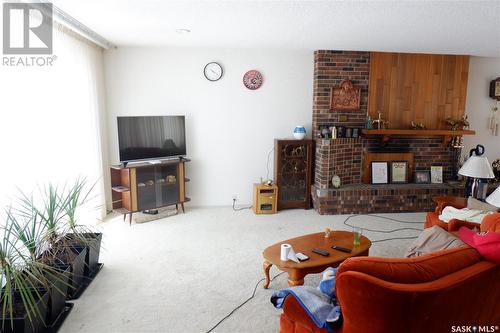 415 5Th Avenue E, Assiniboia, SK - Indoor Photo Showing Other Room With Fireplace