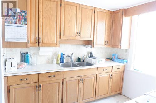 415 5Th Avenue E, Assiniboia, SK - Indoor Photo Showing Kitchen With Double Sink