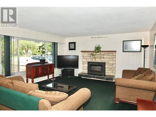 6453 Park Drive, Oliver, BC - Indoor Photo Showing Living Room With Fireplace
