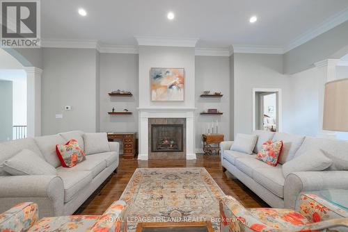 #23 -2014 Valleyrun Blvd, London, ON - Indoor Photo Showing Living Room With Fireplace