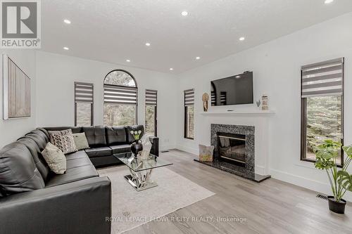 2 Currie Drive, Puslinch, ON - Indoor Photo Showing Living Room With Fireplace