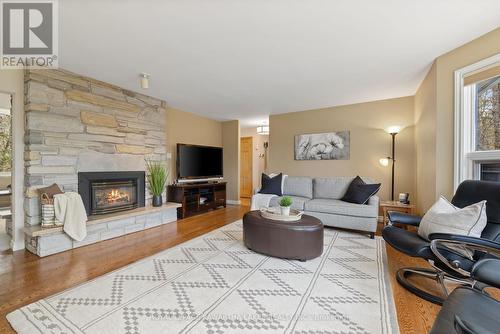 28 Golf Club Crescent, Kawartha Lakes, ON - Indoor Photo Showing Living Room With Fireplace