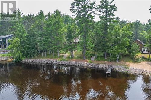 27 Rocky Shores Lane, Round Lake Centre, ON - Outdoor With Body Of Water