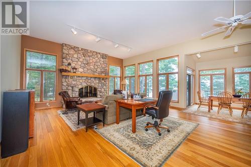 27 Rocky Shores Lane, Round Lake Centre, ON - Indoor Photo Showing Other Room With Fireplace