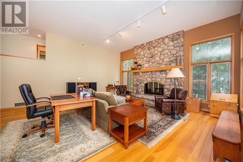 27 Rocky Shores Lane, Round Lake Centre, ON - Indoor With Fireplace