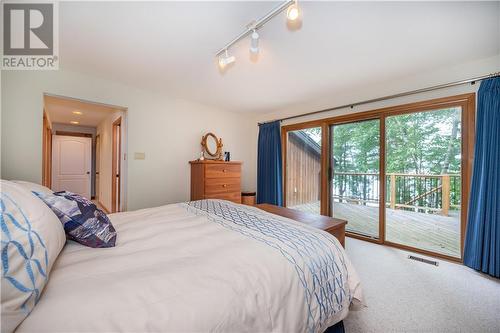 27 Rocky Shores Lane, Round Lake Centre, ON - Indoor Photo Showing Bedroom