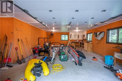 Interior of Detached Garage - 27 Rocky Shores Lane, Round Lake Centre, ON - Indoor Photo Showing Garage