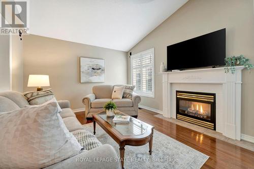 251 Braithwaite Ave, Hamilton, ON - Indoor Photo Showing Living Room With Fireplace